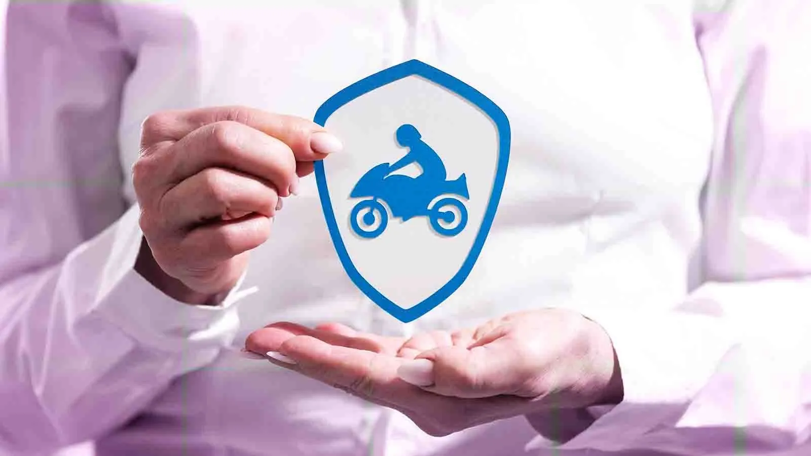 Introduction to Two-Wheeler Insurance - Person displaying a two-wheeler vehicle protected by insurance from DgNote.Technologies Pvt. Ltd.